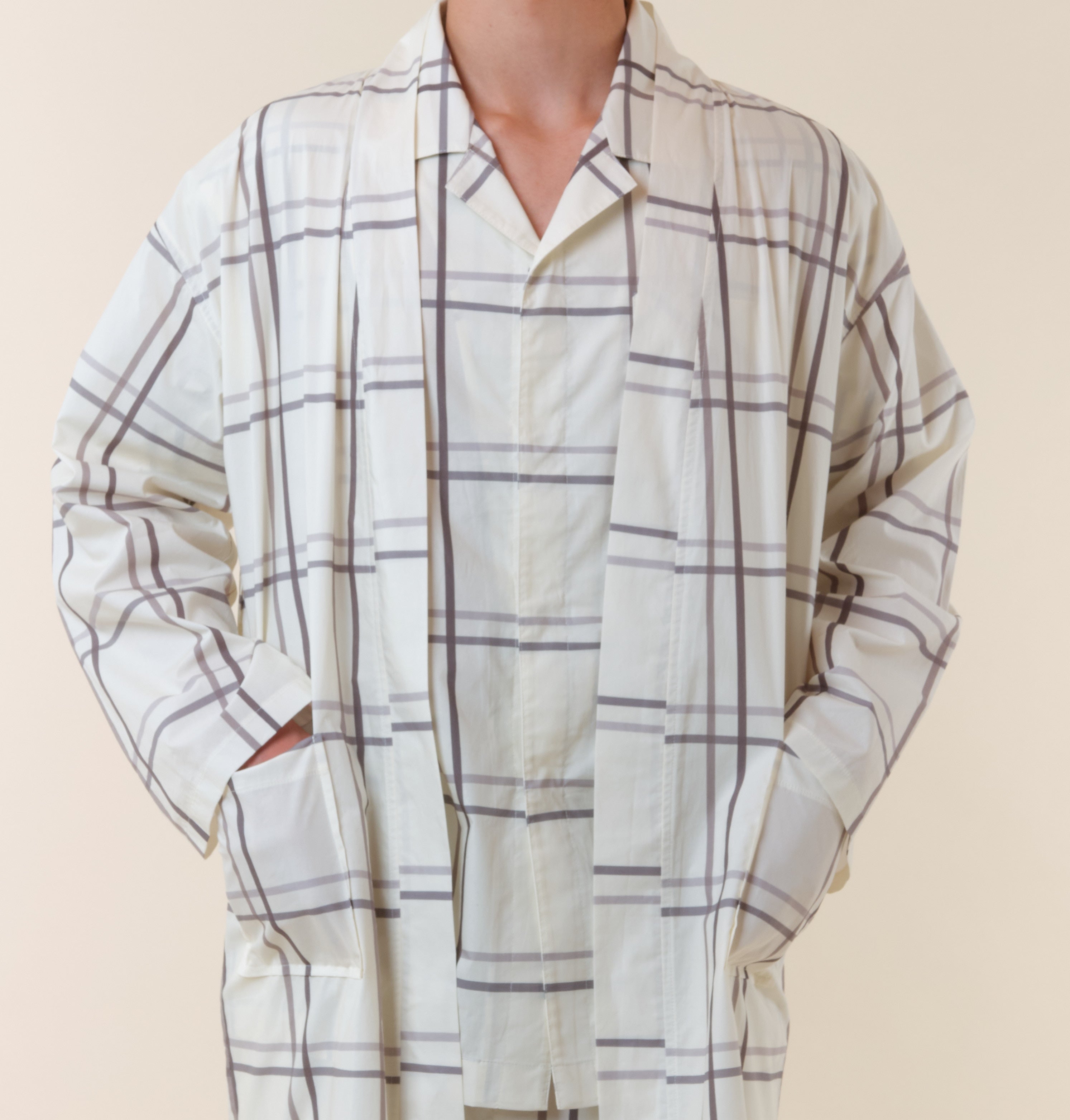 Woman wearing TONIC Womens Hush Dressing Gown in Silver Linings. 100% soft cotton hospital dressing gown designed for dignity, warmth and coverage. Features long sleeves and extra-long wrap ties for secure comfort during hospital stays or recovery. Ideal to wear with a hospital gown, nightie or pyjamas for gentle, practical support.