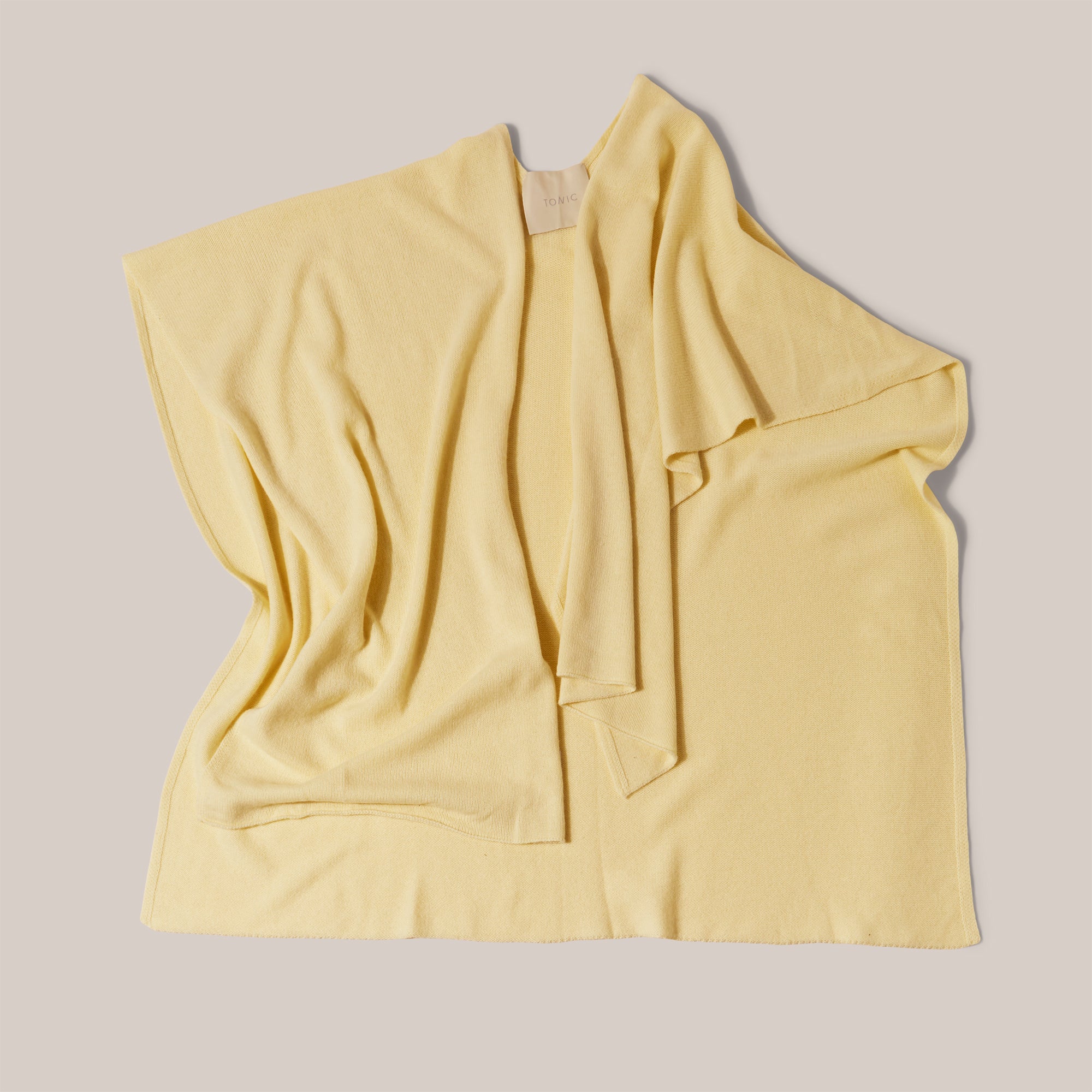 Product image of lemon colour  luxury cashmere shawl to be worn during treatment or post surgery recovery, shawl shown flat