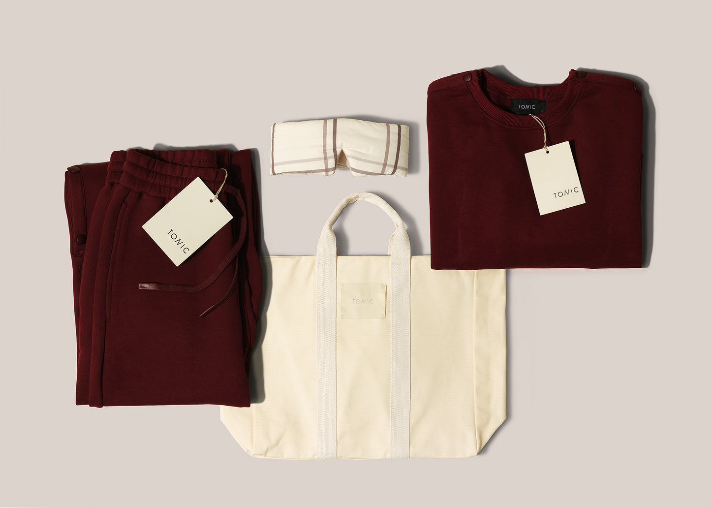 Image of items contained in TONIC chemotherapy bundle in burgundy